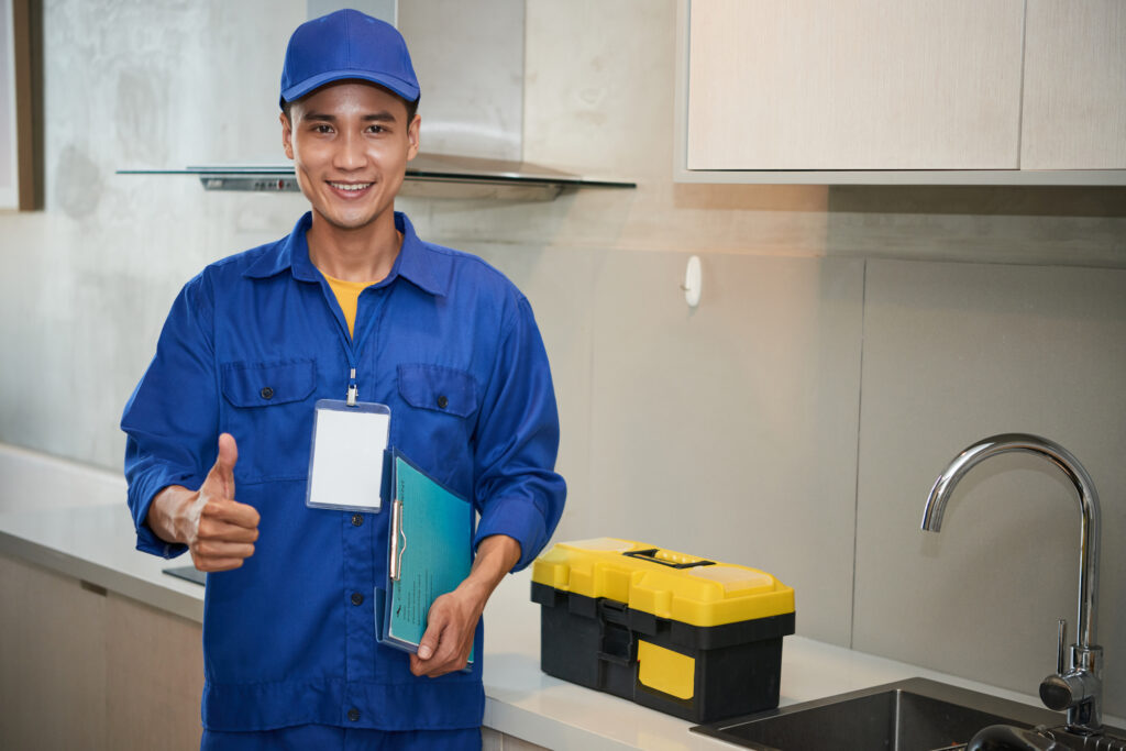 Repairman in kitchen